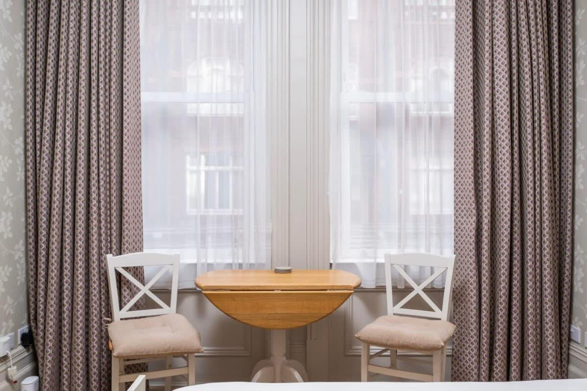 Charming Chelsea Studio Your Cozy Urban Retreat لندن المظهر الخارجي الصورة